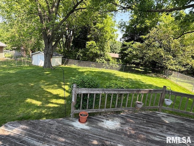 218 W Kurlene Dr, Macomb, IL 61455 - deck featuring a fenced backyard and a shed