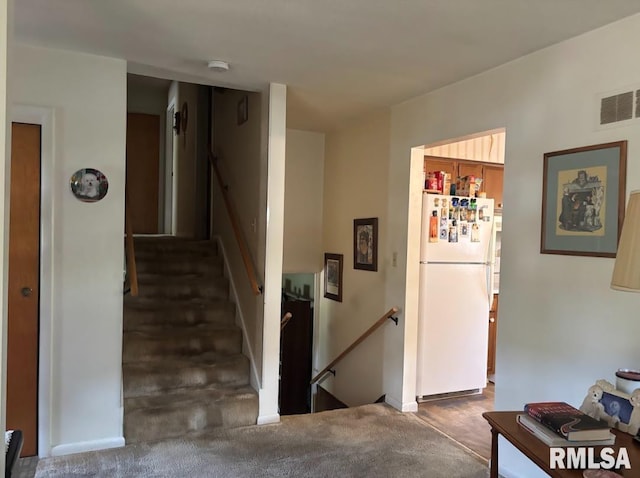 218 W Kurlene Dr, Macomb, IL 61455 - corridor featuring an upstairs landing and carpet floors