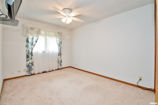 100 Oakridge Ct, Dahinda, IL 61428 - spare room with ceiling fan and light colored carpet