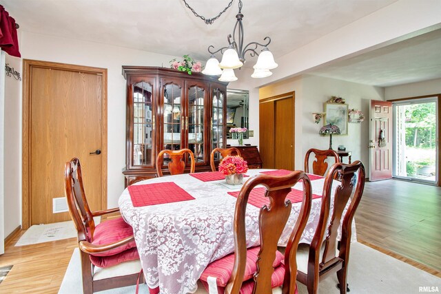 100 Oakridge Ct, Dahinda, IL 61428 - dining room with a chandelier and light wood finished floors