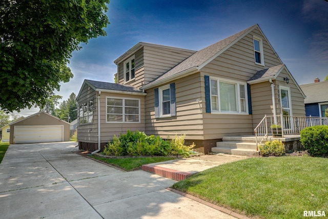1030 E Euclid Ave, Peoria Heights, IL 61616 - bungalow-style house with a garage, an outbuilding, roof with shingles, and a front lawn