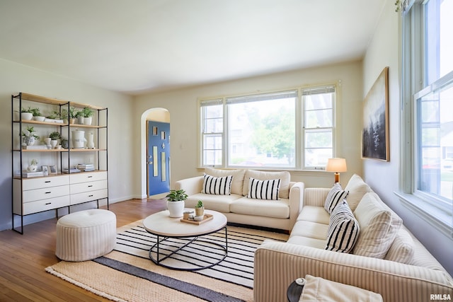 1030 E Euclid Ave, Peoria Heights, IL 61616 - living area with arched walkways and wood finished floors