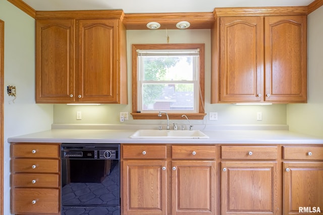 1030 E Euclid Ave, Peoria Heights, IL 61616 - kitchen featuring dishwasher, light countertops, and brown cabinetry