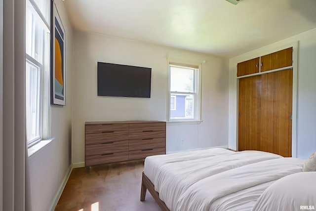 1030 E Euclid Ave, Peoria Heights, IL 61616 - carpeted bedroom featuring baseboards and a closet