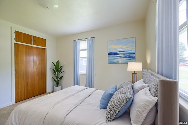 1030 E Euclid Ave, Peoria Heights, IL 61616 - carpeted bedroom featuring a closet and baseboards