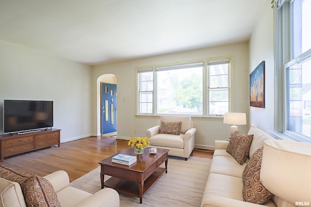 1030 E Euclid Ave, Peoria Heights, IL 61616 - living room with arched walkways and wood finished floors