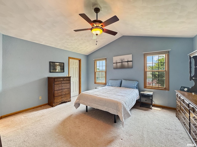 125 Prairieview Dr, East Peoria, IL 61611 - bedroom featuring light colored carpet, multiple windows, vaulted ceiling, ceiling fan, and a closet