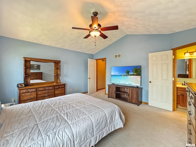 125 Prairieview Dr, East Peoria, IL 61611 - bedroom with light colored carpet, vaulted ceiling, a ceiling fan, and ensuite bath