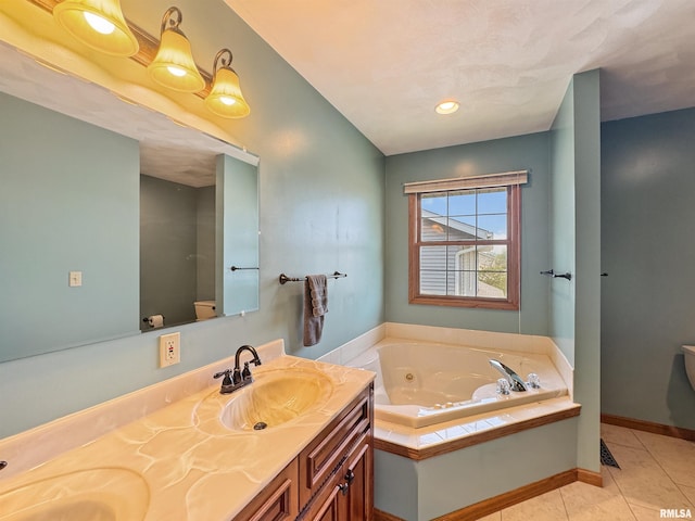 125 Prairieview Dr, East Peoria, IL 61611 - full bath with double vanity, a whirlpool tub, and tile patterned flooring