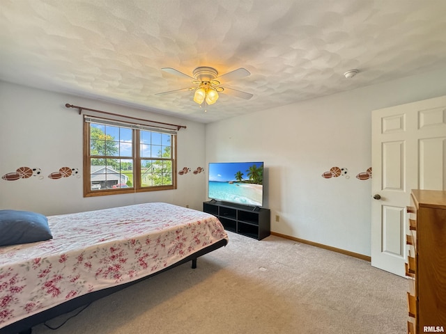 125 Prairieview Dr, East Peoria, IL 61611 - carpeted bedroom featuring baseboards and a ceiling fan