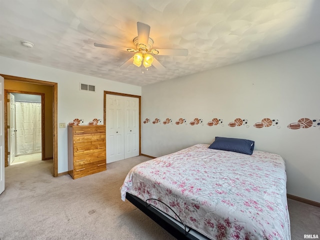 125 Prairieview Dr, East Peoria, IL 61611 - carpeted bedroom with a closet and ceiling fan