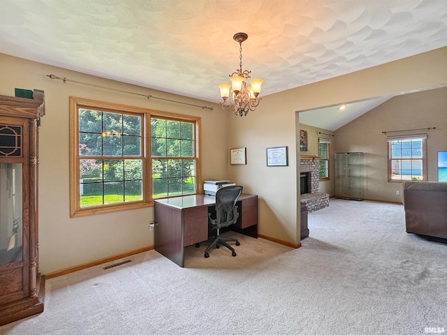 125 Prairieview Dr, East Peoria, IL 61611 - office area featuring a fireplace, carpet, a chandelier, and vaulted ceiling