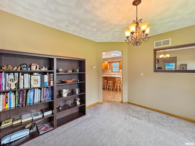 125 Prairieview Dr, East Peoria, IL 61611 - living area featuring a chandelier and carpet floors