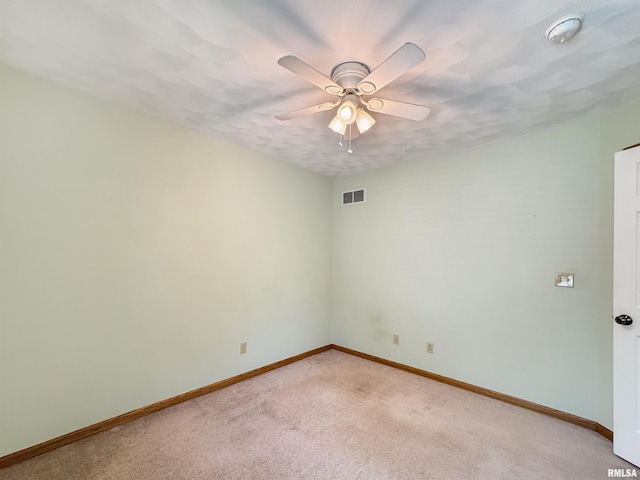 125 Prairieview Dr, East Peoria, IL 61611 - empty room with a smoke detector, a ceiling fan, and light colored carpet