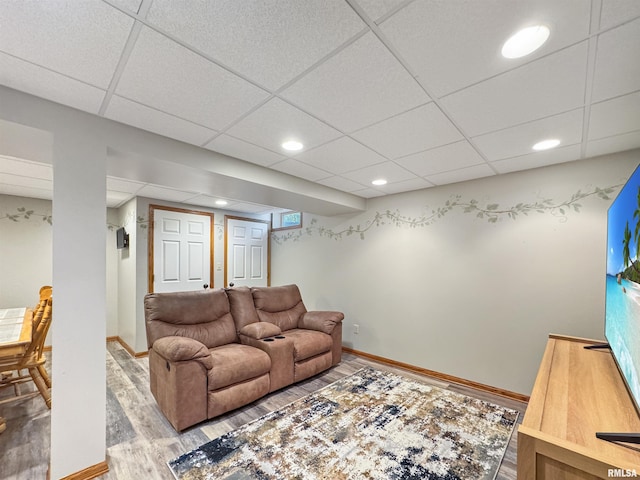 125 Prairieview Dr, East Peoria, IL 61611 - living room with wood finished floors, a paneled ceiling, and recessed lighting