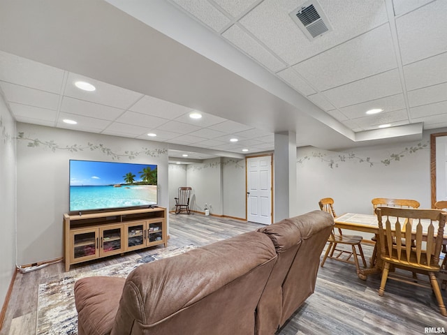 125 Prairieview Dr, East Peoria, IL 61611 - living area with a paneled ceiling, wood finished floors, and recessed lighting