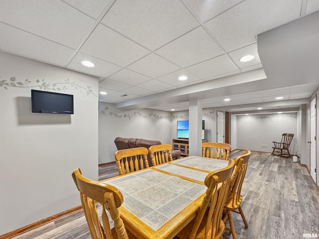 125 Prairieview Dr, East Peoria, IL 61611 - dining area with wood finished floors, a paneled ceiling, and recessed lighting