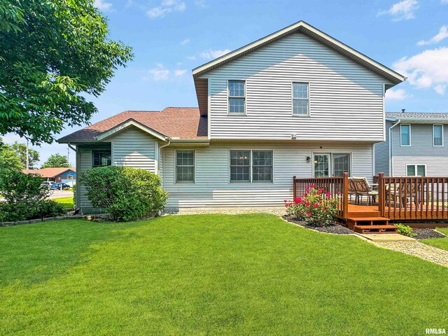 125 Prairieview Dr, East Peoria, IL 61611 - rear view of property with a deck, a lawn, and roof with shingles