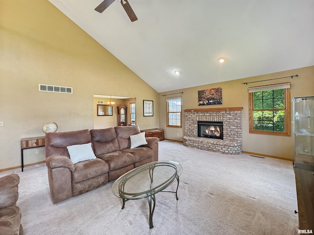 125 Prairieview Dr, East Peoria, IL 61611 - living area with carpet flooring, healthy amount of natural light, a ceiling fan, and high vaulted ceiling