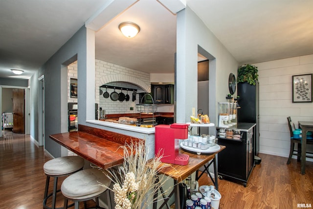 324 Pinecrest Dr, Germantown Hills, IL 61548 - kitchen featuring wood finished floors and wooden walls