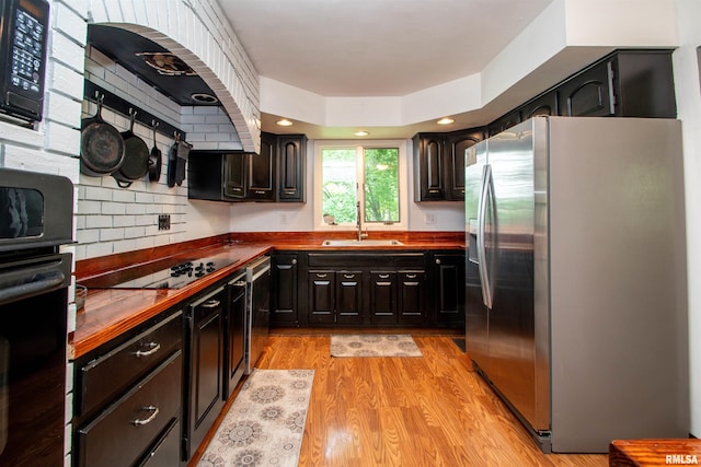 324 Pinecrest Dr, Germantown Hills, IL 61548 - kitchen featuring black appliances, wooden counters, custom range hood, light wood finished floors, and recessed lighting