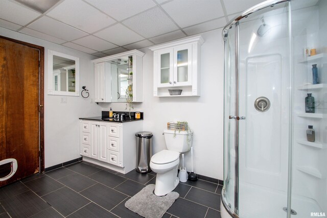 324 Pinecrest Dr, Germantown Hills, IL 61548 - full bathroom with vanity, a shower stall, tile patterned floors, and a drop ceiling
