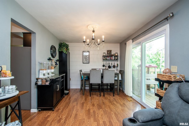 324 Pinecrest Dr, Germantown Hills, IL 61548 - dining space featuring a chandelier and wood finished floors