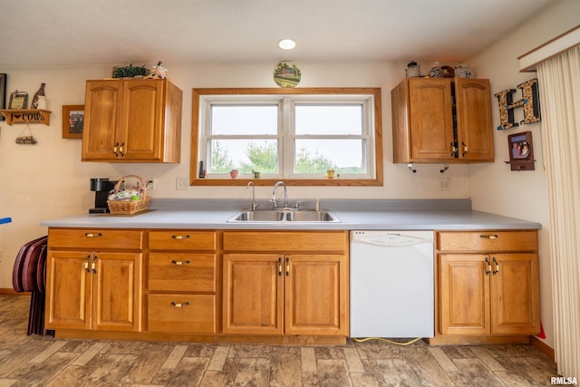 21501 N Berchtold Rd, Chillicothe, IL 61523 - kitchen with white dishwasher, light countertops, and brown cabinetry