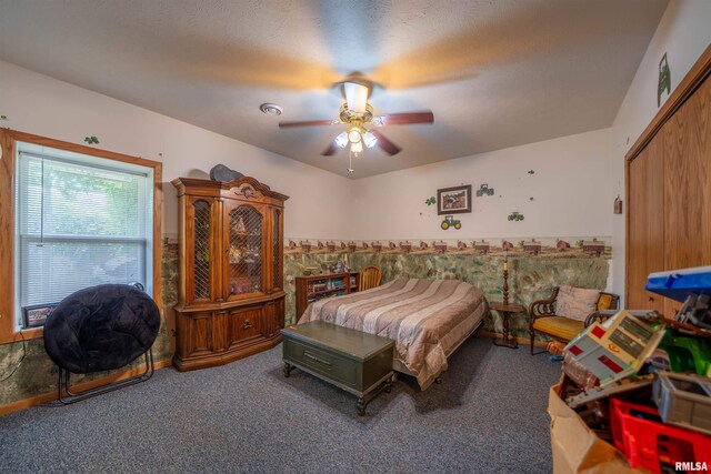 21501 N Berchtold Rd, Chillicothe, IL 61523 - bedroom with carpet and a ceiling fan
