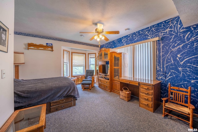 21501 N Berchtold Rd, Chillicothe, IL 61523 - bedroom featuring wallpapered walls, carpet, a textured ceiling, ornamental molding, and a ceiling fan