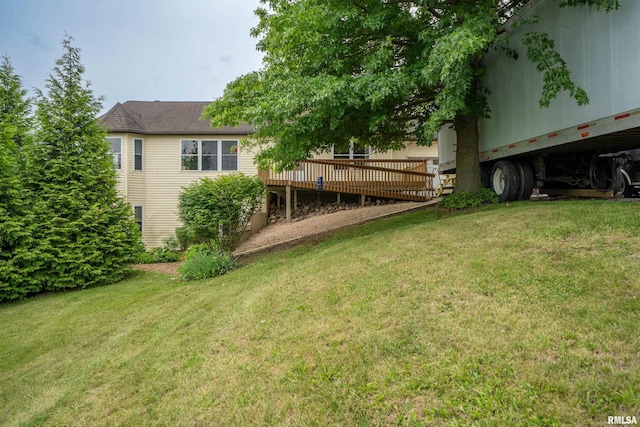 21501 N Berchtold Rd, Chillicothe, IL 61523 - view of green lawn with a deck