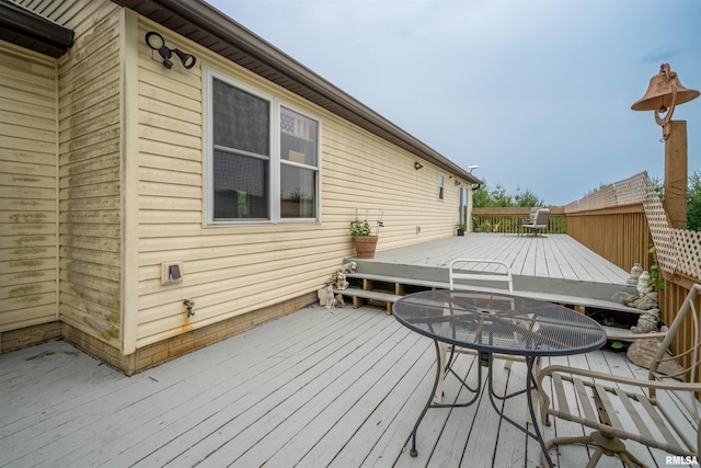 21501 N Berchtold Rd, Chillicothe, IL 61523 - wooden deck with outdoor dining area