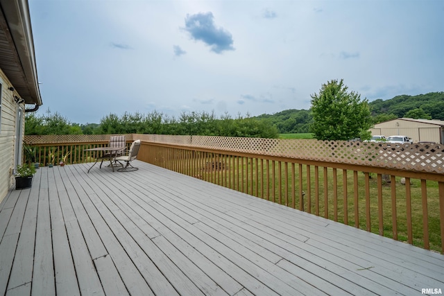 21501 N Berchtold Rd, Chillicothe, IL 61523 - wooden terrace featuring a lawn
