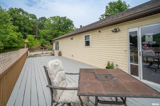 21501 N Berchtold Rd, Chillicothe, IL 61523 - wooden deck with outdoor dining space