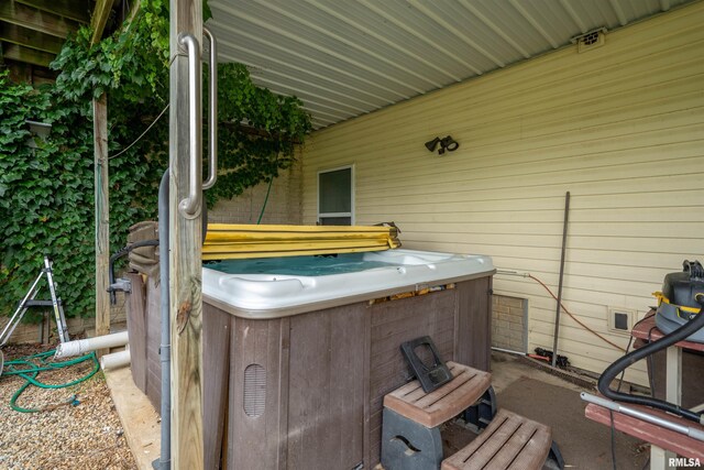 21501 N Berchtold Rd, Chillicothe, IL 61523 - view of patio / terrace featuring a hot tub