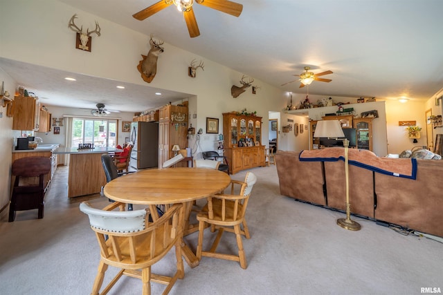 21501 N Berchtold Rd, Chillicothe, IL 61523 - dining area featuring ceiling fan, lofted ceiling, recessed lighting, and light colored carpet