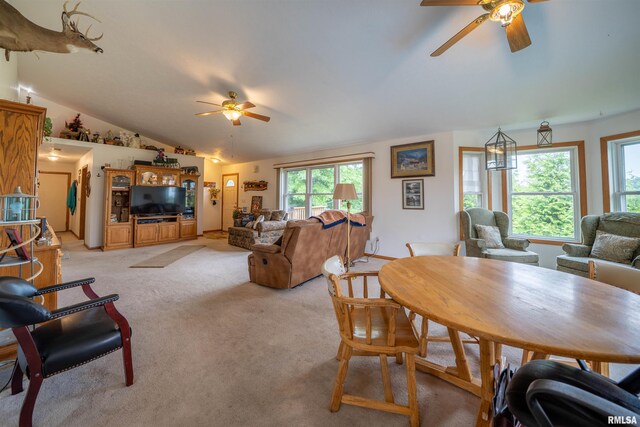 21501 N Berchtold Rd, Chillicothe, IL 61523 - living area with a ceiling fan, light carpet, and vaulted ceiling