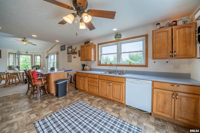 21501 N Berchtold Rd, Chillicothe, IL 61523 - kitchen with dishwasher, ceiling fan, stone finish floors, light countertops, and recessed lighting