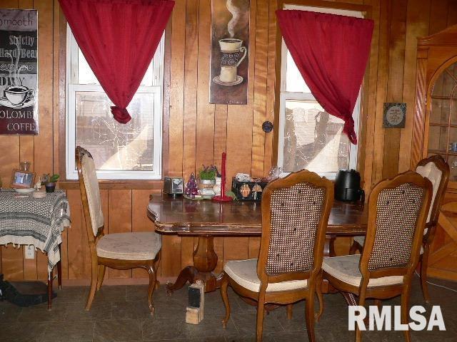 2803 W Fremont St, Peoria, IL 61605 - dining space with wooden walls