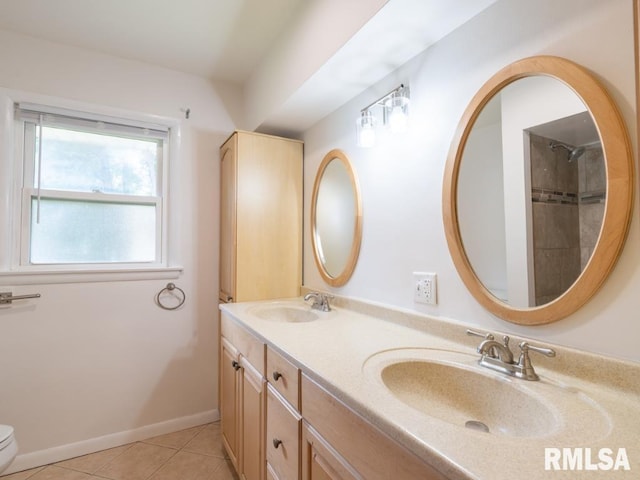 621 E Sciota Ave, Peoria Heights, IL 61616 - bathroom with double vanity and tile patterned flooring