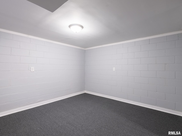 621 E Sciota Ave, Peoria Heights, IL 61616 - spare room with dark colored carpet and baseboards