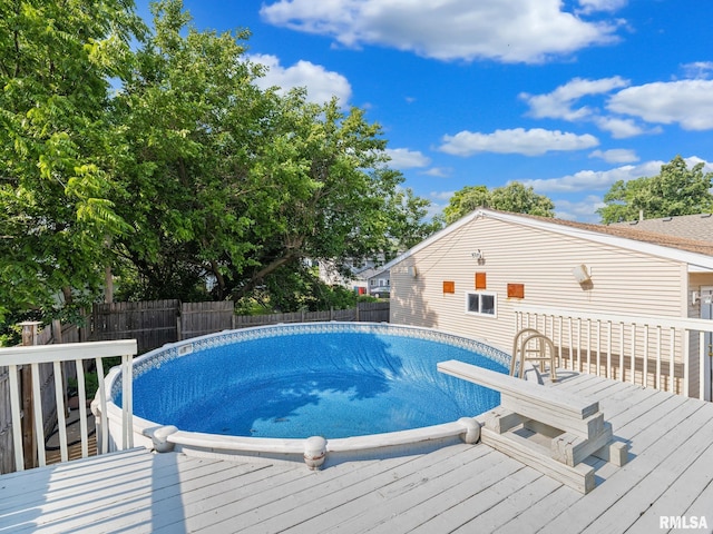 621 E Sciota Ave, Peoria Heights, IL 61616 - view of swimming pool with a fenced backyard and a wooden deck
