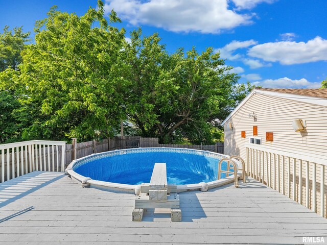 621 E Sciota Ave, Peoria Heights, IL 61616 - view of pool featuring a wooden deck and a fenced backyard