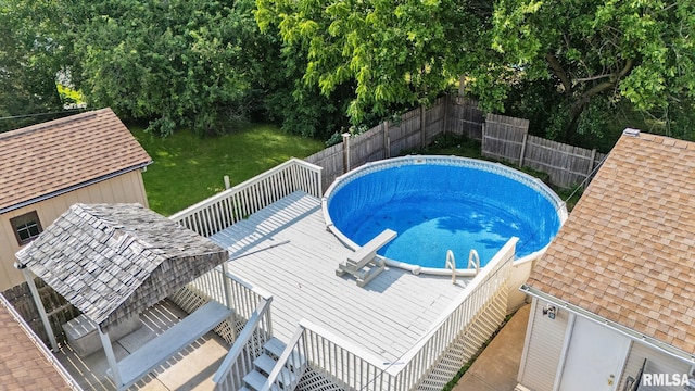 621 E Sciota Ave, Peoria Heights, IL 61616 - view of swimming pool with a deck and a fenced backyard