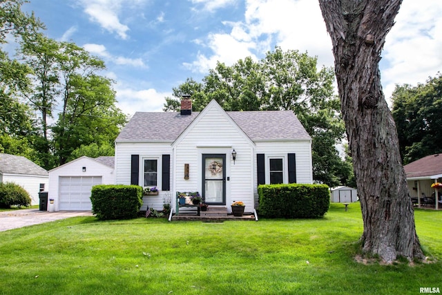 202 Esser St, Washington, IL 61571 - view of front of property with a chimney, roof with shingles, an outdoor structure, and a front lawn