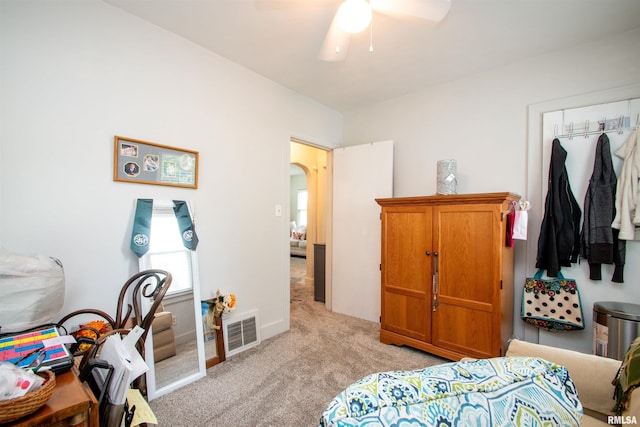 202 Esser St, Washington, IL 61571 - bedroom with light carpet, arched walkways, ceiling fan, and a closet
