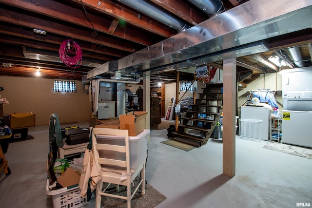 202 Esser St, Washington, IL 61571 - below grade area featuring stairway and washing machine and dryer