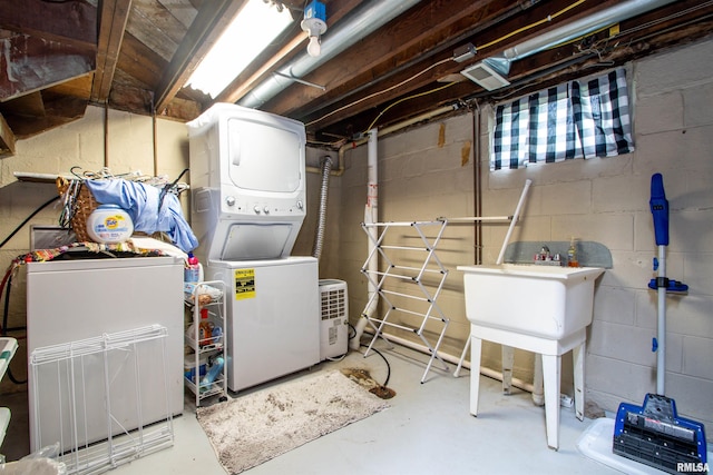 202 Esser St, Washington, IL 61571 - unfinished basement with estacked washer and dryer