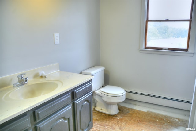 70 Constitution Rd, Colchester, IL 62326 - bathroom featuring baseboard heating and vanity