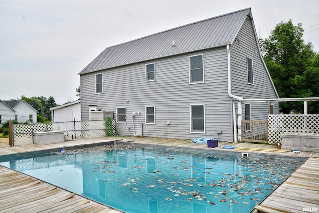 70 Constitution Rd, Colchester, IL 62326 - view of swimming pool with a deck